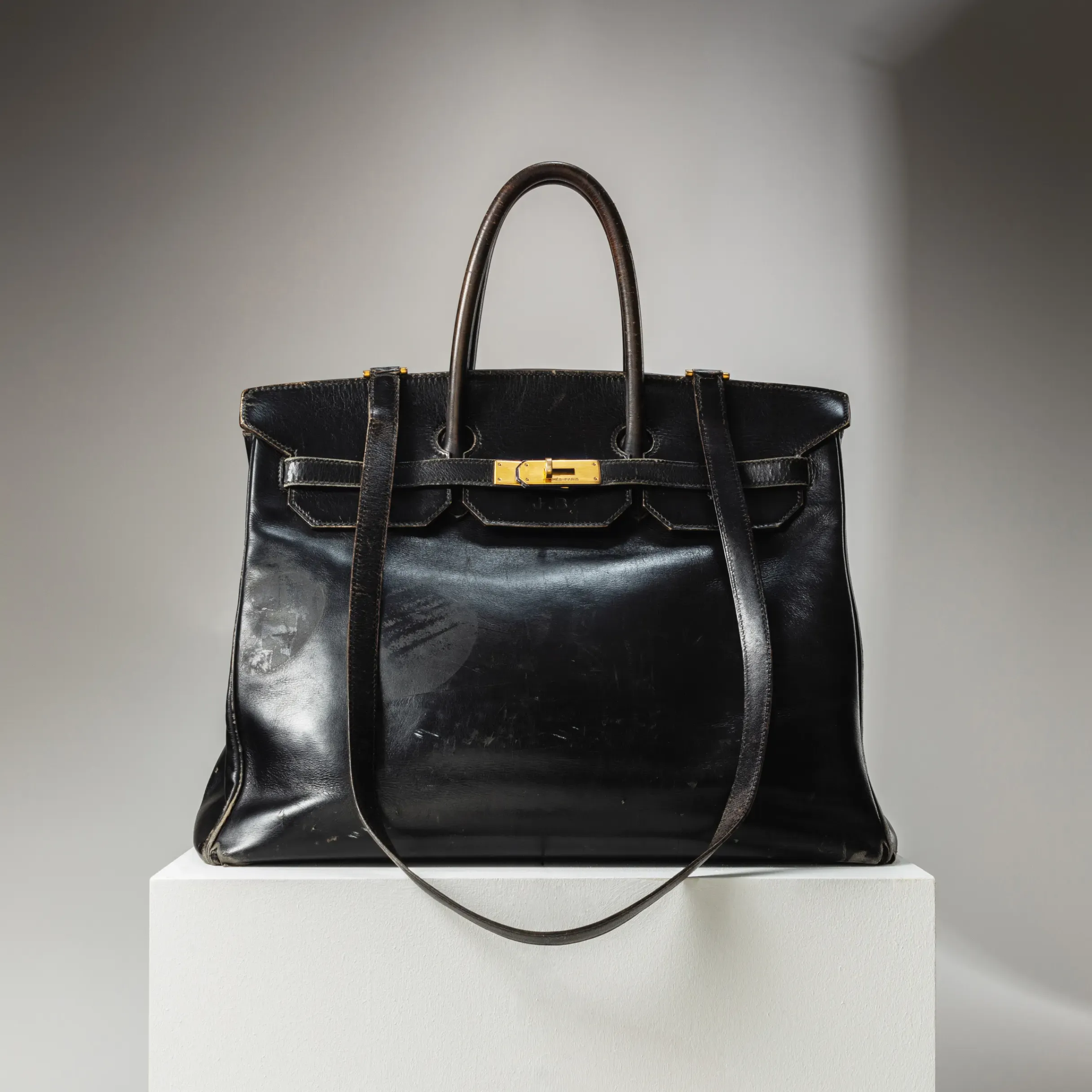  A loveworn Hermès Birkin owned by model and actress Jane Birkin.