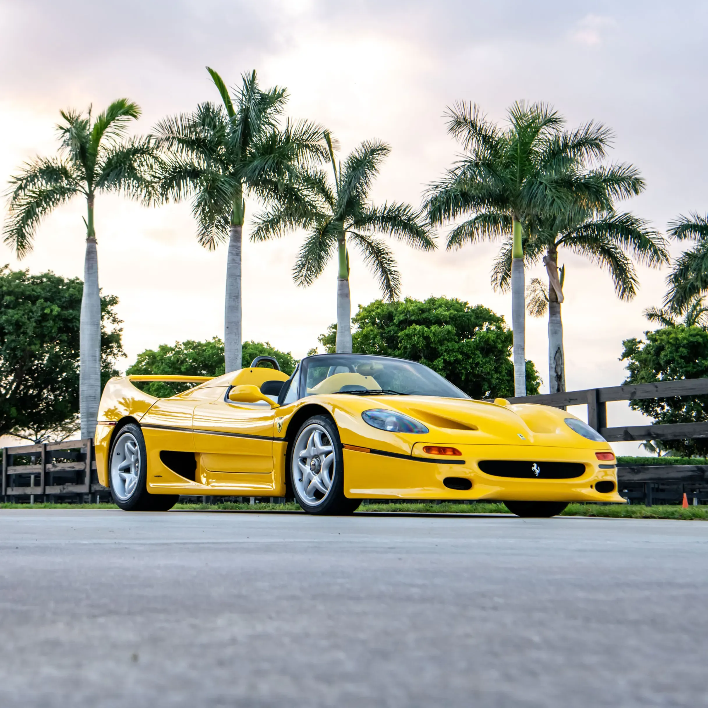 A yellow 1996 Ferrari F50. 