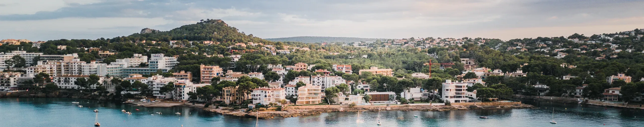 Boats moored off the Santa Ponsa coastline, Majorca, Spain.