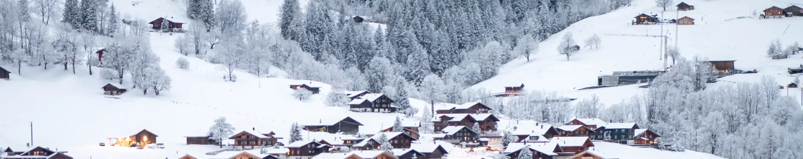 Snowy a village in the mountains in Switzerland. 