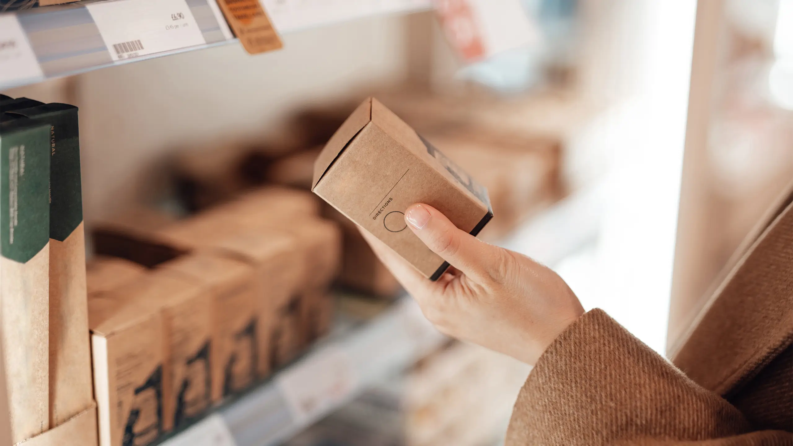 young woman shopping eco friendly personal skincare products in zero waste store